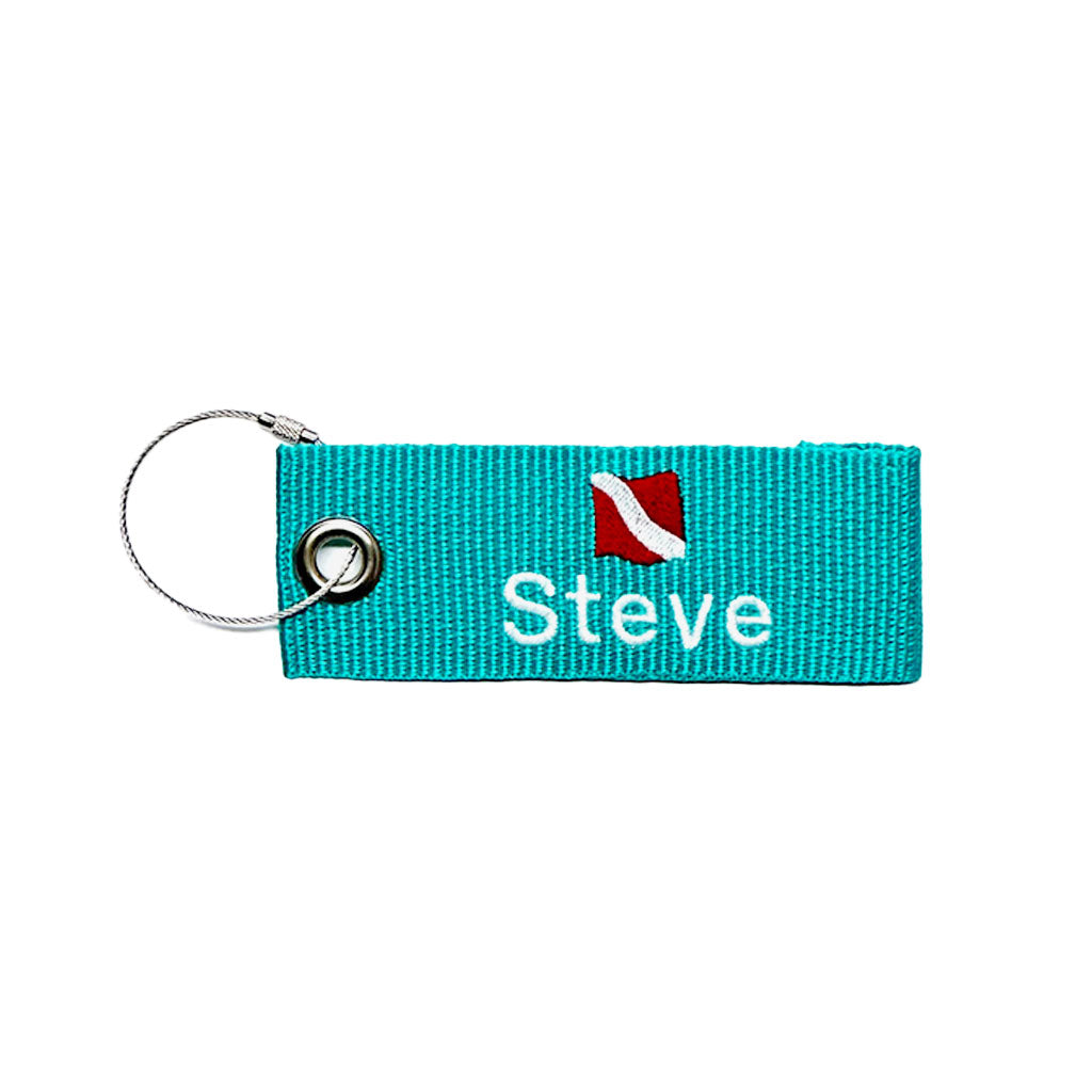 scuba luggage bag tag teal color with dive flag graphic