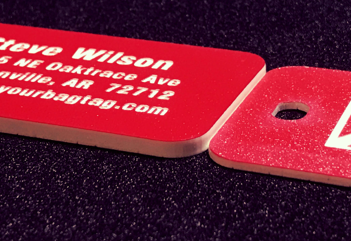 Showing thickness difference of Extreme Luggage Tags