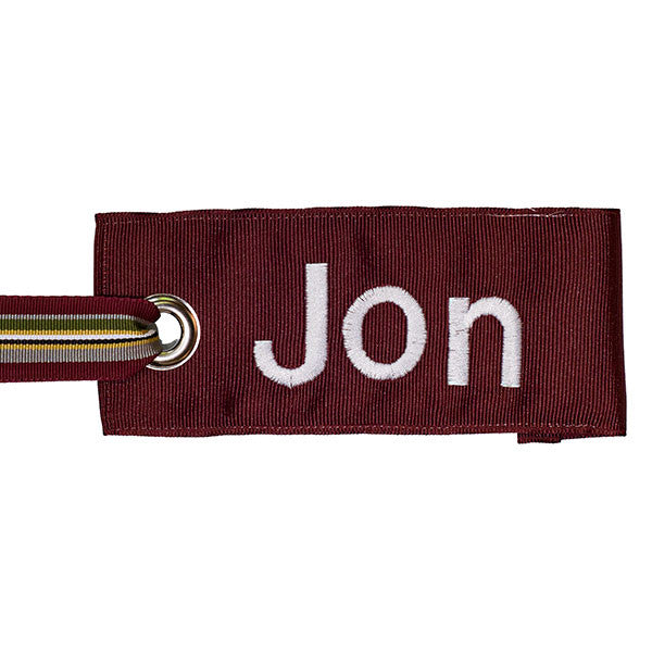 custom maroon luggage tag with white text from YourBagTag