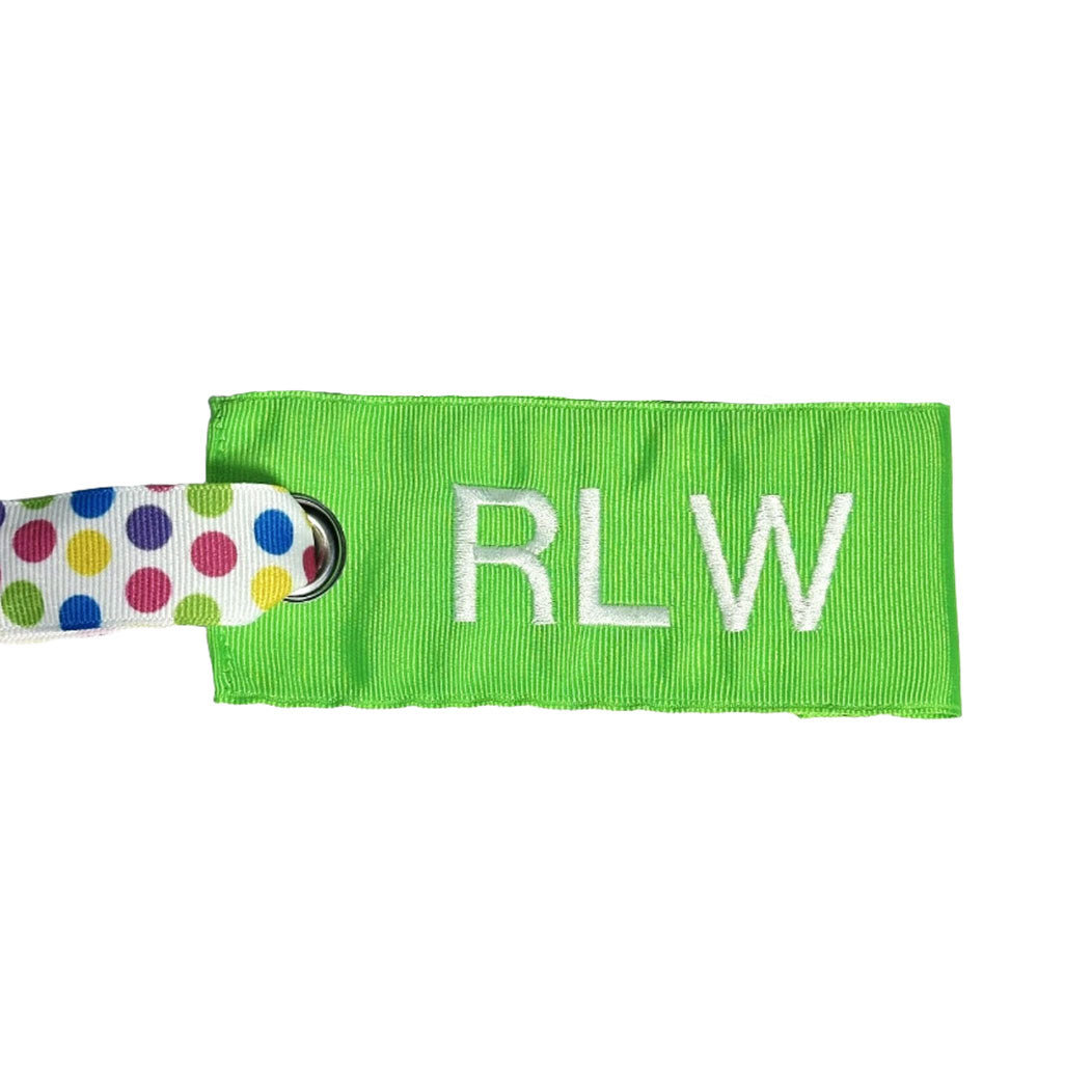 Neon green bag tag - multicolor polka dot handle