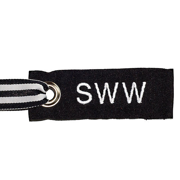 Black mini luggage tag with custom white text