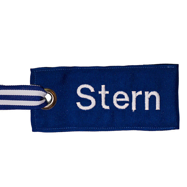 Personalized blue luggage tag with white text from YourBagTag