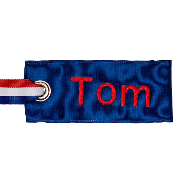 Personalized blue luggage tag with red text from YourBagTag