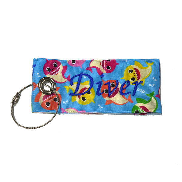 Fabric Luggage Tag - bright blue with colored shark characters