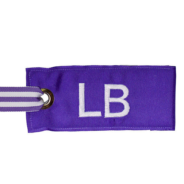 Light purple luggage tag with white text from YourBagTag