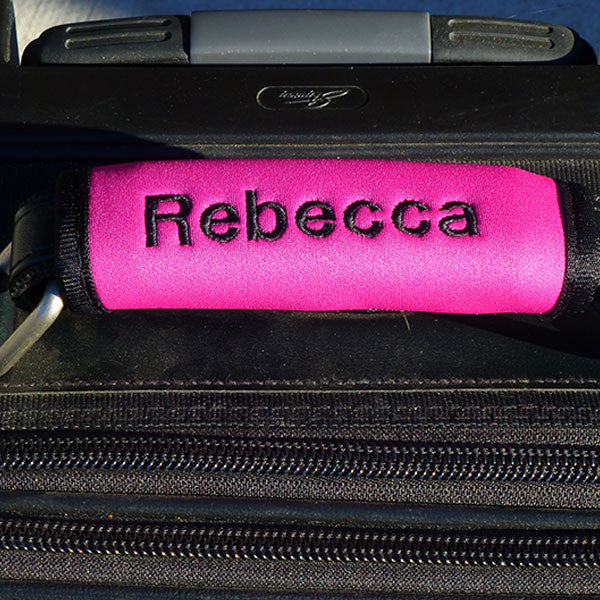 Pink custom luggage handle wrap from YourBagTag.com