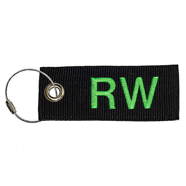 black extreme luggage tag with green text from YourBagTag