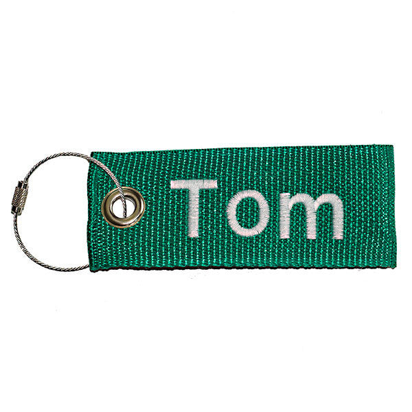 green extreme luggage tag with white text from YourBagTag