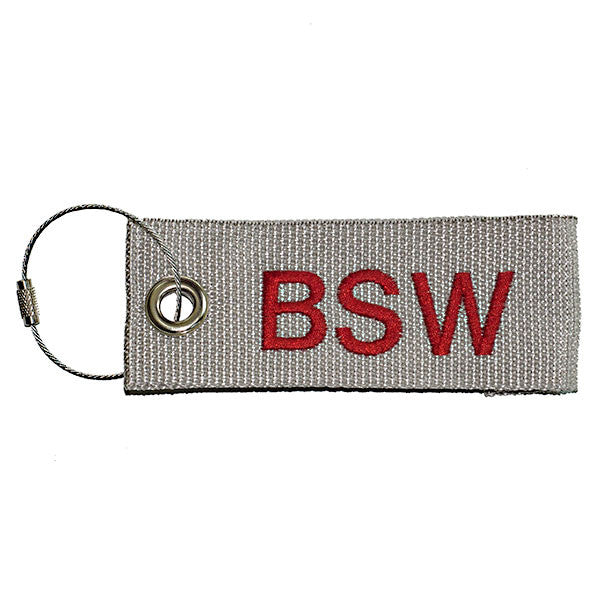 gray extreme luggage tag with red text from YourBagTag