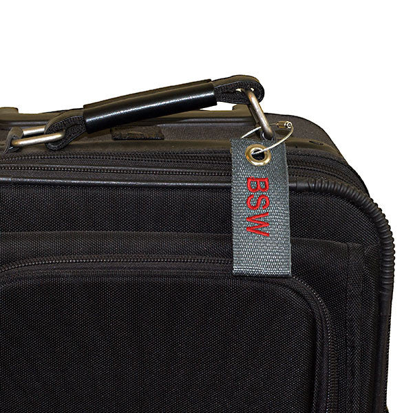 Silver mini luggage tag shown on suitcase | YourBagTag