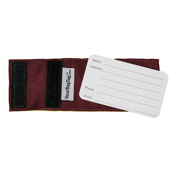 back of maroon luggage tag showing address card insert