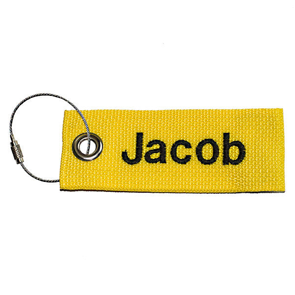 yellow extreme luggage tag with black text from YourBagTag